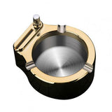 Stainless steel ashtray with built in match striker